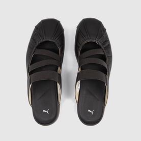 Puma slides in Espresso Bean, black strappy upper with ruched detail, flatform sole, overhead view