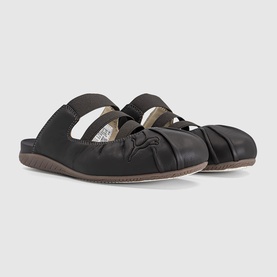 Puma black leather slip-on mule flats with ruched strap detail, cream insole and brown sole, women's shoe