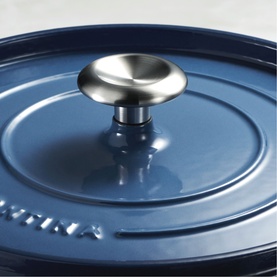 Tramontina blue cast iron casserole lid with brushed silver knob, showing embossed brand name and concentric ring detail.