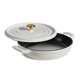 Tramontina latte cast iron pan with matching lid, black interior and gold knob handle, two side handles