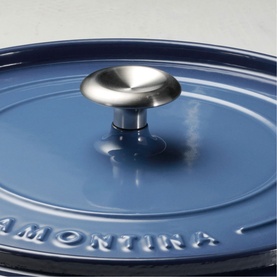 Tramontina blue cast iron pan lid with embossed brand name and silver stainless steel knob handle, close-up detail shot