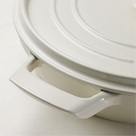 Tramontina Saute Pan in latte, close-up of lid handle and dual side handles on ceramic-style cookware