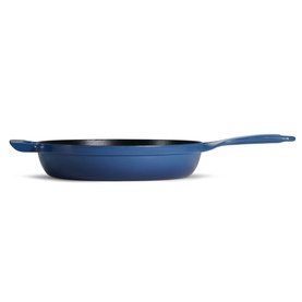 Tramontina blue cast iron skillet with long handle and black interior, side profile view