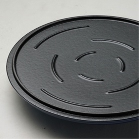 Tramontina Saute Pan in blue, close-up of textured non-stick lid with concentric arc detailing, dark matte finish