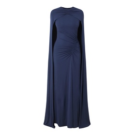 Jonathan Simkhai midnight gown with floor-length silhouette, ruched waist detail, and dramatic flowing cape sleeves in navy blue stretch fabric.