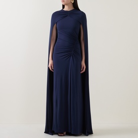 Model wearing Jonathan Simkhai Midnight Gown with draped cape detail and ruched waist in floor-length silhouette