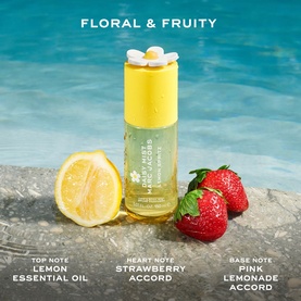 Marc Jacobs Daisy Mist Lemon Spritz Hair and Body Mist bottle displayed with fresh lemon and strawberries, highlighting floral and fruity notes.