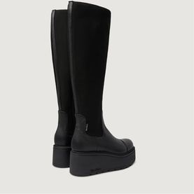 Marco Moreo black knee-high platform boots, stretch panel upper, chunky black sole, rear view