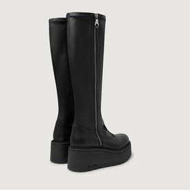 Marco Moreo black leather knee-high platform boots with back zip fastening and chunky black sole, rear view