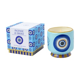 Paddywax A Dopo Eye Ceramic Candle in Incense & Smoke, light blue evil eye design vessel with gold base, shown with matching gift box