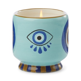 Paddywax A Dopo Eye Ceramic Candle in turquoise with blue evil eye motif, gold rim, and striped base. Incense & Smoke scent.