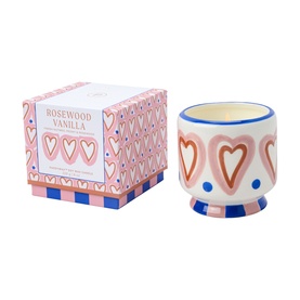 Paddywax A Dopo Hearts Ceramic Candle in Rosewood Vanilla, cream vessel with pink heart pattern and blue dots, shown with matching gift box