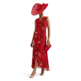 Model wearing Phase Eight red floral chiffon midi dress with ruffle detail, styled with matching red wide-brim hat and white heeled sandals