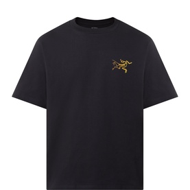 Arcteryx black crew-neck T-shirt with gold embroidered bird logo on chest, short sleeves, cotton-polyester blend