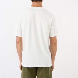 Model wearing Gramicci One Point Chest Pocket T-Shirt in White, back view, with olive green trousers.