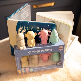 Play Go Chatter Puppets set of four soft pastel finger puppets in box, displayed with Little Bunny board book