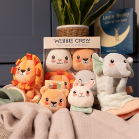 Play Easy Wiggle Crew multi soft toy set featuring lion, bunny and bear plush toys with rattle and soother, styled with a children's book