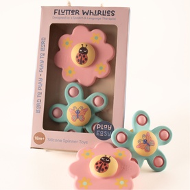 Flutter Whirles silicone spinner toys set in pink and teal, featuring ladybird and butterfly designs, shown in packaging and loose