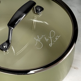 Prochef Signature 20cm Ceramic Pressed Saucepan in sage green with black handle and silver rim, close-up of lid detail