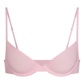 Skims pink underwire bra with smooth cups, adjustable straps, and a minimalist design