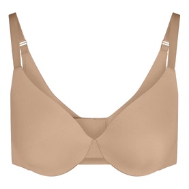 Skims Full Cup Bra in beige with smooth moulded cups, adjustable straps, and a clean minimalist finish