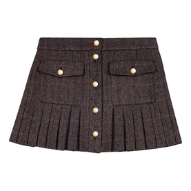 Maje mini skirt in multi check tweed, button-front placket, twin chest pockets, and pleated hem detail