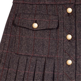 Maje women's multi herringbone tweed skirt with pleated hem, gold-tone buttons, and flap pocket detail.