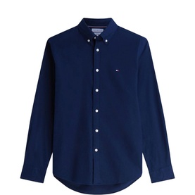 Tommy Hilfiger Carbon Navy long-sleeve button-down Oxford shirt with chest logo badge and curved hem.