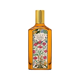 Gucci Flora Gorgeous Gardenia Eau de Parfum in amber glass bottle with floral illustration and gold cap