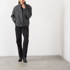 Model wearing Isabel Marant Etoile sand wool-blend blazer with black tailored trousers and black ankle boots.