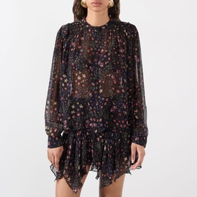 Model wearing Isabel Marant Etoile Florine Abstract Print Blouse in black with floral print, sheer chiffon, gathered shoulders, long sleeves, ruffled