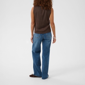 Model wearing Kaffe Coffee Bean sleeveless top, back view, styled with mid-blue wide-leg jeans
