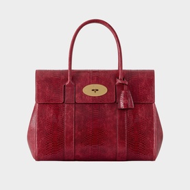 Mulberry Apple Red snake-embossed top handle bag with gold postman's lock clasp, twin handles, and tassel detail