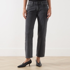 Model wearing Rag & Bone Straight Jeans in angela washed grey denim, styled with black heeled mules