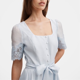 Model wearing pale blue short-sleeve dress with sheer lace trim sleeves, square neckline, button front, and tie waist detail
