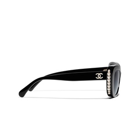 Chanel black rectangular sunglasses with pearl-embellished temples and gold CC logo, gradient grey lenses, side profile view