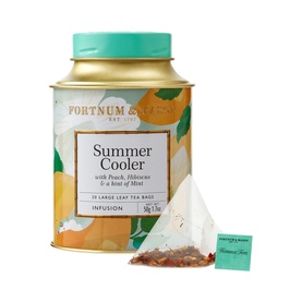 Fortnum & Mason Summer Cooler Silky Tea Bag Tin with teal lid, gold and citrus-print design, beside a pyramid tea bag and label.