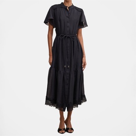 Model wearing black midi shirtdress with flutter sleeves, tie waist, and lace hem trim, styled with black strappy sandals