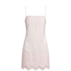 Pale pink satin slip mini dress with delicate lace trim at bust and scalloped lace hem, thin adjustable straps