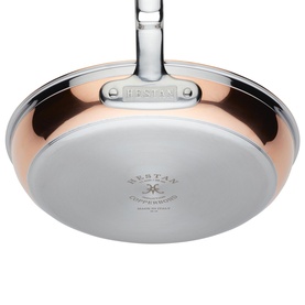Hestan Copperbond Skillet 28cm in copper, showing stainless steel base and silver long handle, five-layer construction, handcrafted in Italy