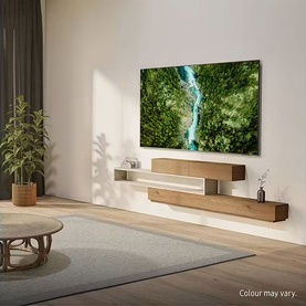 Samsung 75 Inch U8000F Crystal 4K Smart TV in black, wall-mounted in a bright modern living room with floating wooden media unit