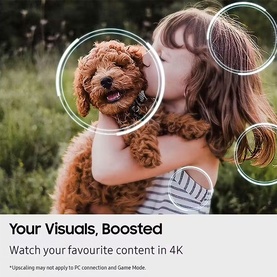 Samsung 75 Inch U8000F Crystal 4K Smart TV lifestyle shot showing vibrant 4K upscaling with a girl and golden doodle puppy image.