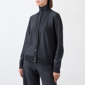Model wearing Source Unknown Fabbie Layered Cardigan in charcoal, featuring turtleneck, V-neckline, button front, and ribbed trims, styled with