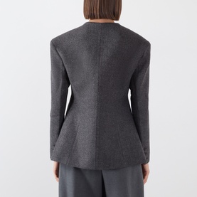 Model wearing Source Unknown Banton Double-Breasted Jacket in charcoal, showing structured back seaming and hourglass silhouette, styled with grey