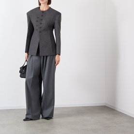 Model wearing Source Unknown Banton Double-Breasted Jacket in charcoal, collarless with structured shoulders, styled with wide-leg trousers and black