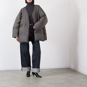 Model wearing Source Unknown Egizio Wrap Jacket in charcoal, styled with dark wide-leg jeans and black heeled boots
