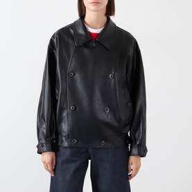 Model wearing Source Unknown Viellino Faux Leather Jacket in black, double-breasted with shirt collar, styled with red top and blue jeans.