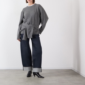 Model wearing Source Unknown Tio Shawl Sweater in charcoal with dark wide-leg jeans and black heeled mules