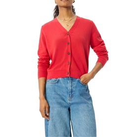 Model wearing Whistles red button-front V-neck cardigan, styled with light blue wide-leg jeans.