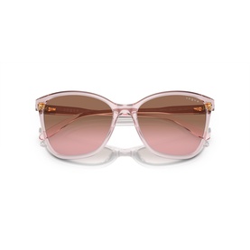 Translucent pink cat-eye sunglasses with gold-tone hardware and gradient pink-brown lenses